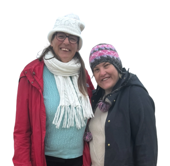 Two women smiling at camera