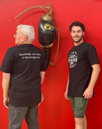 Two men posing for photo