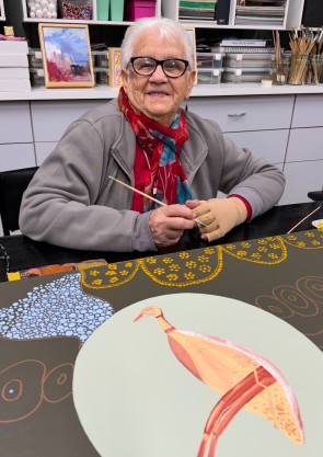 Elderly woman smiling at camera