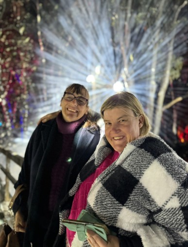 Two women smiling at camera